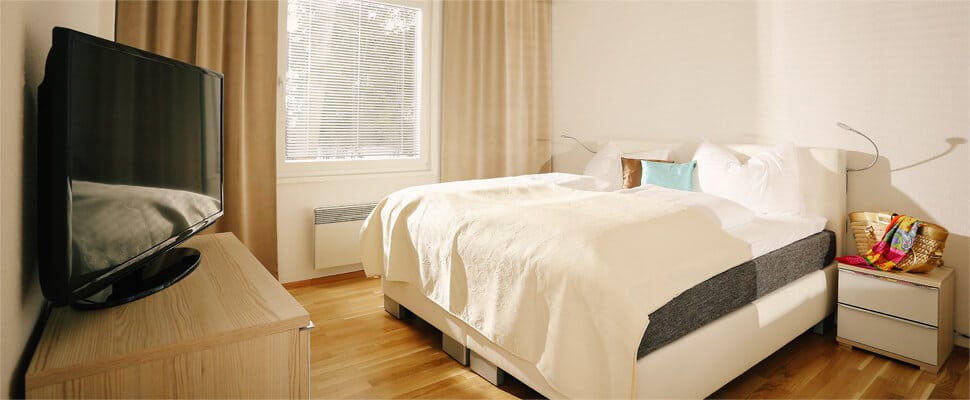 Schlafzimmer mit Seeblick – Ferienwohnung Wörthersee