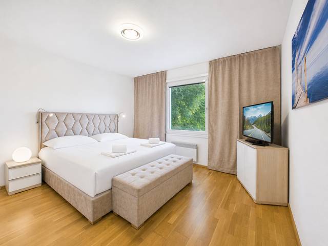 Schlafzimmer – Deluxe Bungalow – Ferienwohnung Wörthersee