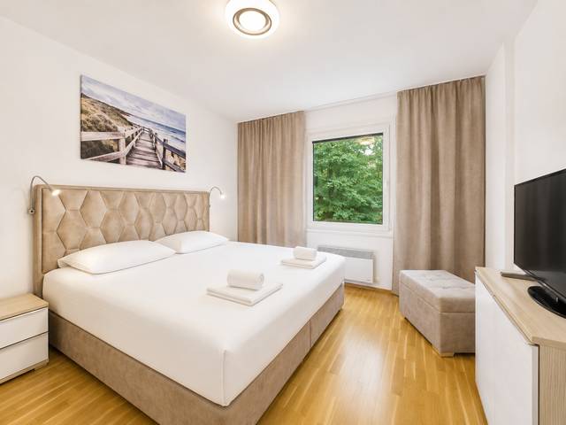Schlafzimmer – Deluxe Bungalow – Ferienwohnung Wörthersee