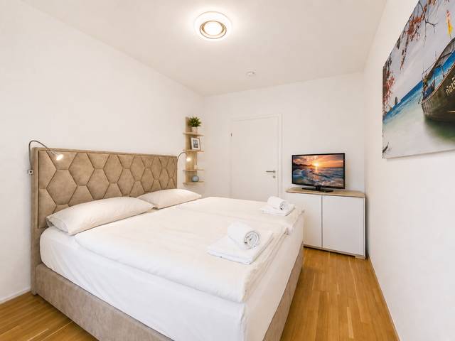 Schlafzimmer – Deluxe Bungalow – Ferienwohnung Wörthersee