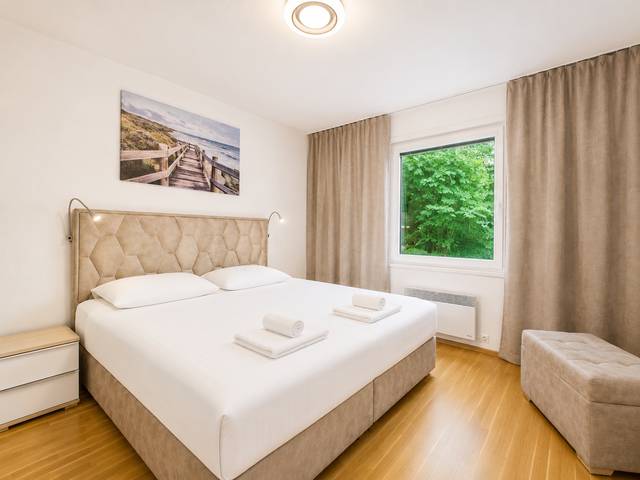 Schlafzimmer – Deluxe Bungalow – Ferienwohnung Wörthersee