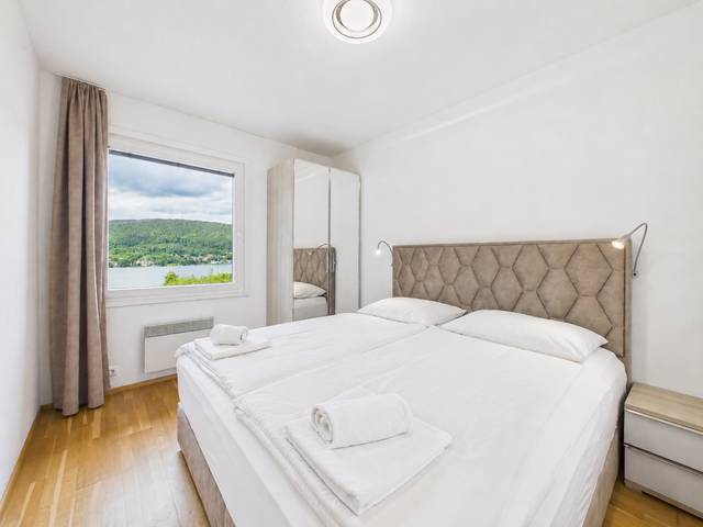 Schlafzimmer – Deluxe Bungalow – Ferienwohnung Wörthersee