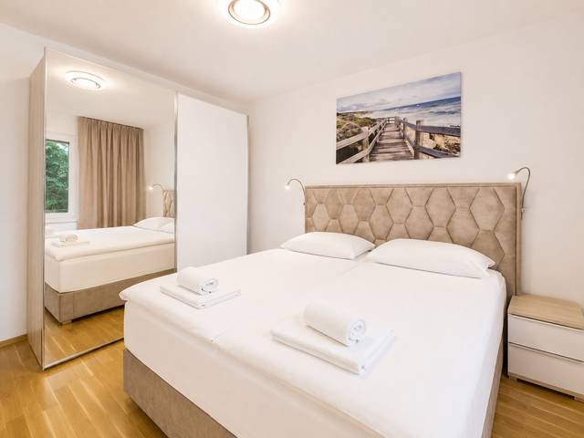 Schlafzimmer – Deluxe Bungalow – Ferienwohnung Wörthersee