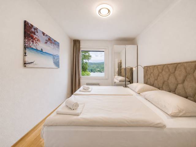 Schlafzimmer – Deluxe Bungalow – Ferienwohnung Wörthersee