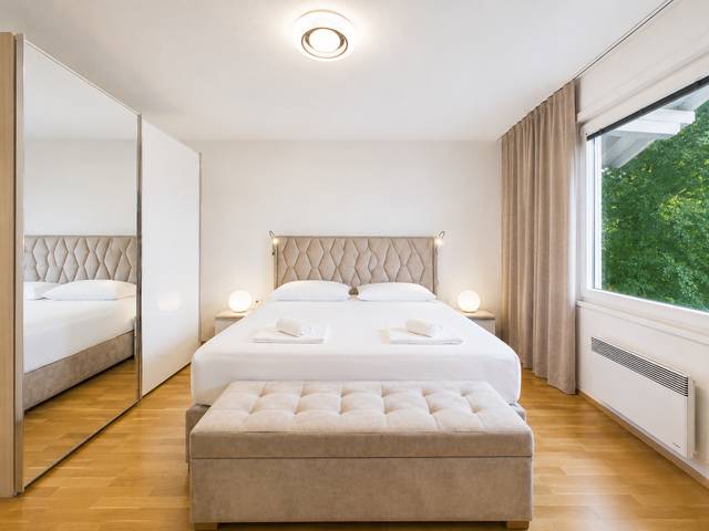 Schlafzimmer – Deluxe Bungalow – Ferienwohnung Wörthersee
