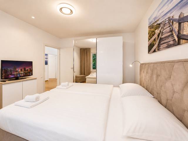 Schlafzimmer – Deluxe Bungalow – Ferienwohnung Wörthersee