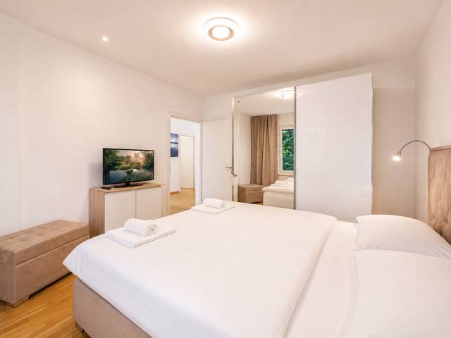 Schlafzimmer – Deluxe Bungalow – Ferienwohnung Wörthersee