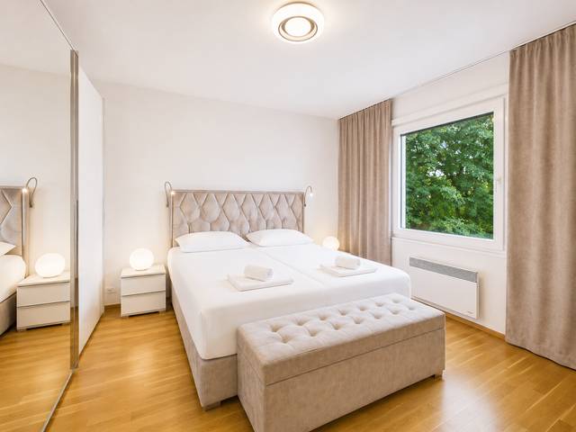 Schlafzimmer – Deluxe Bungalow – Ferienwohnung Wörthersee